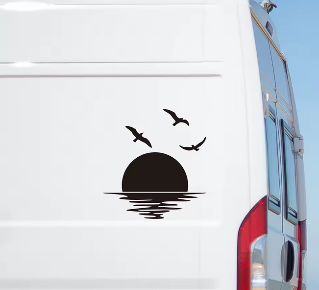 Sticker auto rezistent, rasarit de soare cu mare si pasari